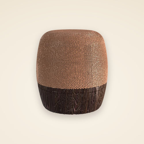 ambielo — a rounded barrel of woven copper on a walnut base